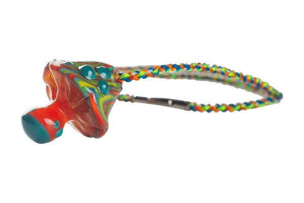 This is the psychedelic mushroom pendant from technicolor tonys available at Ritual Colorado. The beautiful glass pendant comes with a Knotty Laces including clasp so you can wear it around and show off this beautiful glass creation.