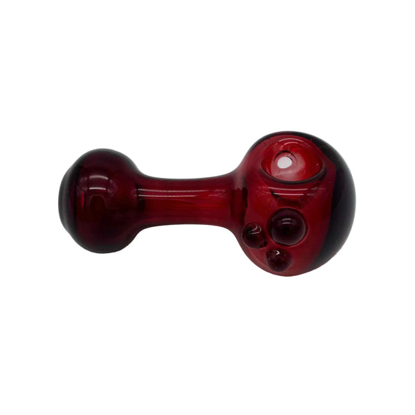 This is the Phoenix Spoon Pipe by Technicolor Tony available at Ritual Colorado. A sleek handmade glass pipe featuring a vibrant red color in an easily handheld shape.