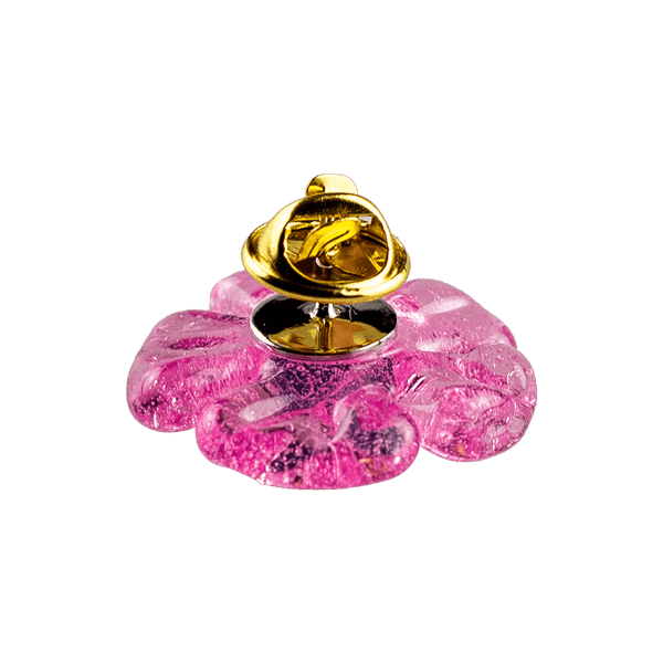 These are glass flower pins from Technicolor Tonys available at Ritual Colorado. The beautiful floral shapes feature a pin and closure on the back so you can easily pop them on your hat or other favorite place to display glass art.