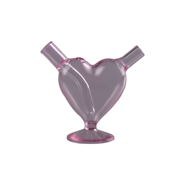 This is the Pink Heart Joint Bubbler from Ritual Glass available at Ritual Colorado. A compact and portable travel rig featuring a 8mm female connection for compatibility with joints, blunts and Dynavap tips.