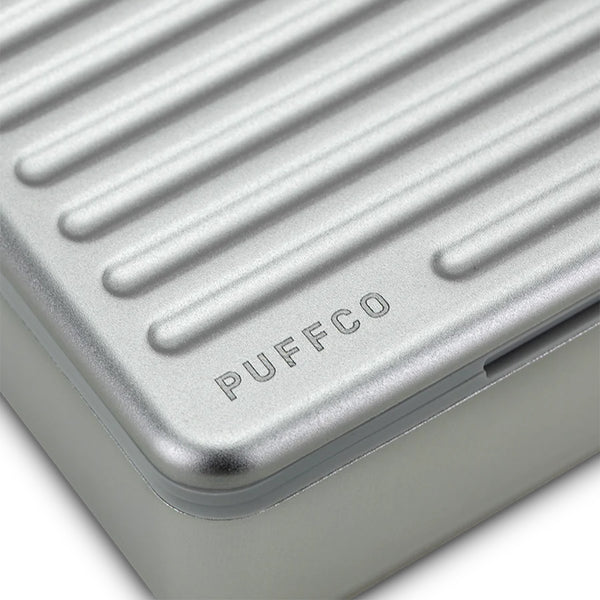This is the Pivot Travel Case by Puffco available at Ritual Colorado. A sleek aluminum exterior carrying case with soft silicone interior to reduce noise while on the go.