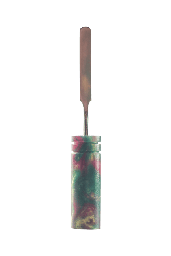 This is the Pomegranate Martini dab tool from Hash Handlez available at Ritual Colorado. A beautiful hand made dabber that features a spade tip, resin handle and protective hard case.