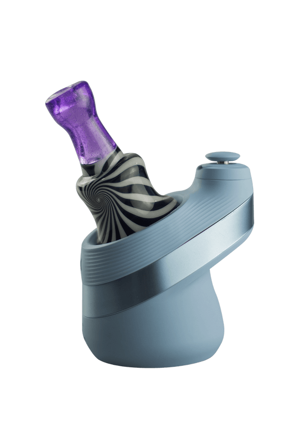 This is the Pinstripe Puffco Peak Dry Top from Technicolor Tonys available at Ritual Colorado. Featuring a black and white swirling base accented by a bright colored mouthpiece.