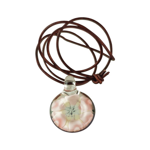 This is the Rainbow Burst Dot Stack Pendant from Faltermeier Glass available at Ritual Colorado. This beautiful handmade glass pendant features impressive dot work with tons of swirling colors.