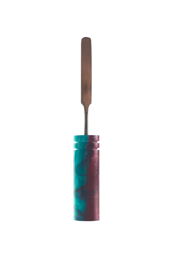 This is the Raspberry dab tool from Hash Handlez available at Ritual Colorado. These beautiful handmade dab tools feature vibrant resin handles and a protective hard case.