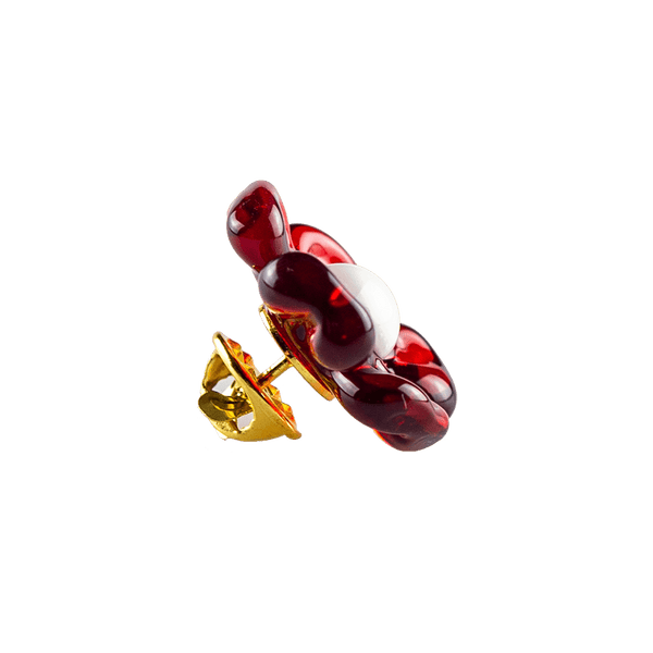 These are glass flower pins from Technicolor Tonys available at Ritual Colorado. The beautiful floral shapes feature a pin and closure on the back so you can easily pop them on your hat or other favorite place to display glass art.