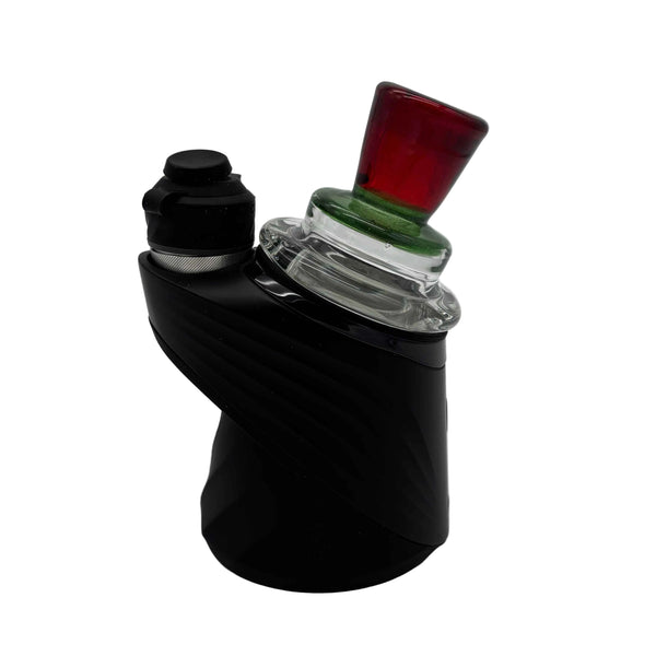This is the Red & Green Wide Airflow Peak Top by Technicolor Tony available at Ritual Colorado. A sleek handmade glass upgrade to your Puffco Peak featuring vibrant red & sparkly green glass colors.
