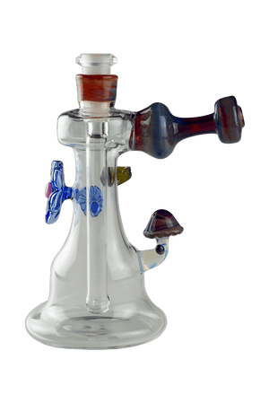 This is the Shroom Flower Bubbler from Technicolor Tonys available at Ritual Colorado. This beautiful heady glass piece features a stable base and clear glass which is accented by colorful flowers and a mushroom.