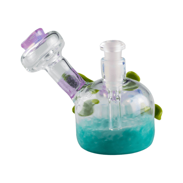 This is the Spring Pastel Mini Bubbler from Technicolor Tonys available at Ritual Colorado. A beautiful heady rig that features flowers and leaf accents on the body and a 10mm female connection.