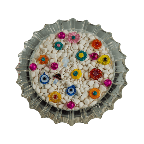 This is a collection of Gemball Machine prizes featuring a Ritual Co. sticker, a 3mm ruby terp pearl and your selection from Technicolor Tony's local glass art. Available at Ritual Colorado you can buy a spin for just $2.