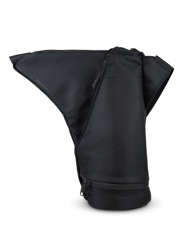 This is the Peak Journey Travel Bag by Puffco available at Ritual Colorado. Featuring multiple zippered pockets, a cld area with included freezer pack and adjustable strap this is a stylish and convenient way to carry your dab gear.