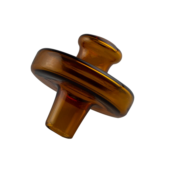 This is a UFO Carb Cap from Ritual Glass available at Ritual Colorado. It features a beautiful amber color and wide air hole which can be tapped for efficient concentrate vaporization. A great addition to any banger dab setup with some added sleekness.