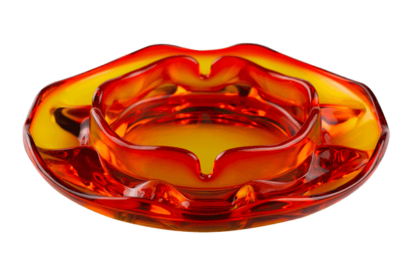 This is the Viking Dual Pipe & Ciagrette Ashtray in Persimmon from Heady Vintage available at Ritual Colorado. The many compartments and indents provide ample storage for your devices and accessories in this beautiful vintage glass ashtray.