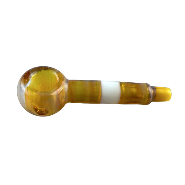 This is the Yellow Colorful Stripe Spoon by Biting Glass available at Ritual Colorado. A vibrant handmade glass pipe made in Denver, CO featuring hidden UV light surprises.