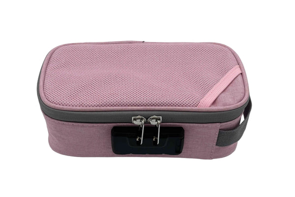 This is the Pink Locking Zipper Stash Bag by Ritual Co. available at Ritual Colorado. A sleek portable carry case that is weather resistant, has a programmable combination lock and features many customization options to fit all your gear.