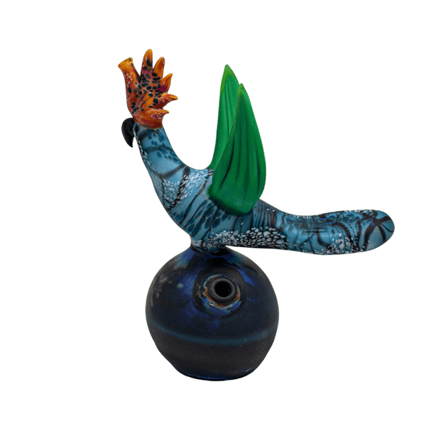 This is the Bird in Paradise rig from Hardman Art Glass available at Ritual Colorado. It features stunning colors with a matte finish in this one-of-a-kind masterpiece. This handblown heady glass is an incredible addition to any collection.