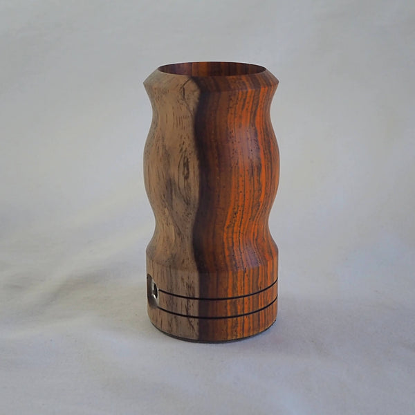 This is Ed's TnT Special Edition WoodScents AromaLog in Cocobolo wood available at Ritual. Shown from the side showing the beautiful wood grain of the AromaLog.