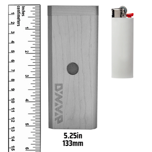 This shows the size of the DynaVap DynaStashXL compared to a ruler and regular lighter. The DynaStashXL is 5.25 inches tall. Available at Ritual.