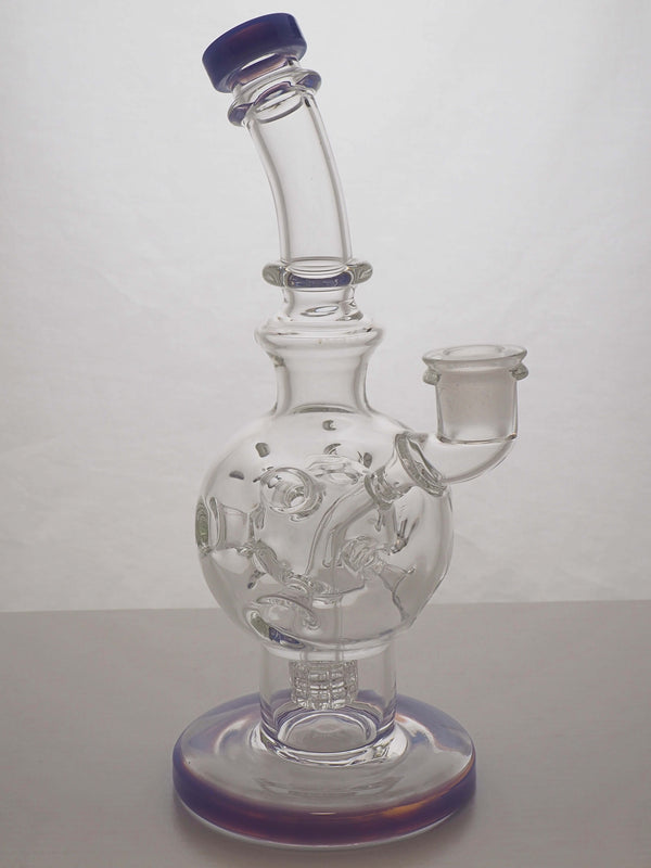 This is the Swiss Cheese Moon water piece from Ritual Glass. Featuring a swiss perc in the body for maximum cooling this is a great everyday piece of glass.