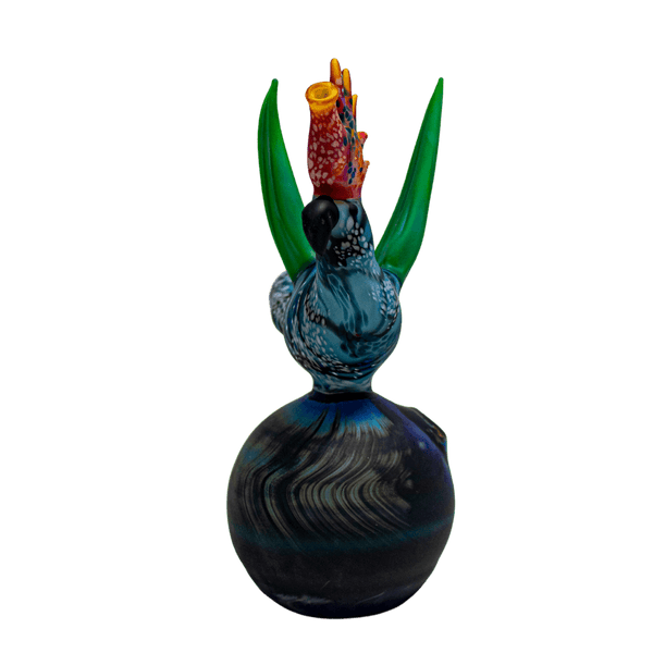 This is the Bird in Paradise rig from Hardman Art Glass available at Ritual Colorado. It features stunning colors with a matte finish in this one-of-a-kind masterpiece. This handblown heady glass is an incredible addition to any collection.