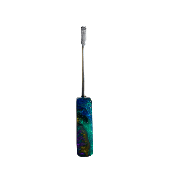 This is a rounded tip dab tool from The Terp Tool Company available at Ritual. Featuring a convenient rounded dab tip and ergonomic resin handle these unique dab tools provide a convenient and personalized dabbing experience.