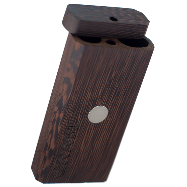 This is the DynaVap DynaStash in Wenge wood. Featuring a magnet for quick DynaVap cap cooling and separate compartments for your flower and DynaVap. Available at Ritual.