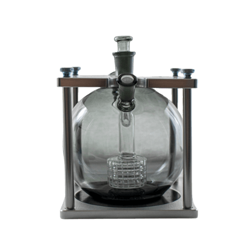 This is the Elephant Cage from Ritual Glass available at Ritual Colorado. Featuring a massive globe body this impressive water piece provides maximum vapor cooling for the perfect hit every time. Includes an aluminum cage, three connections, a trumpet mouthpiece, and whip this is a great daily driver glass piece!