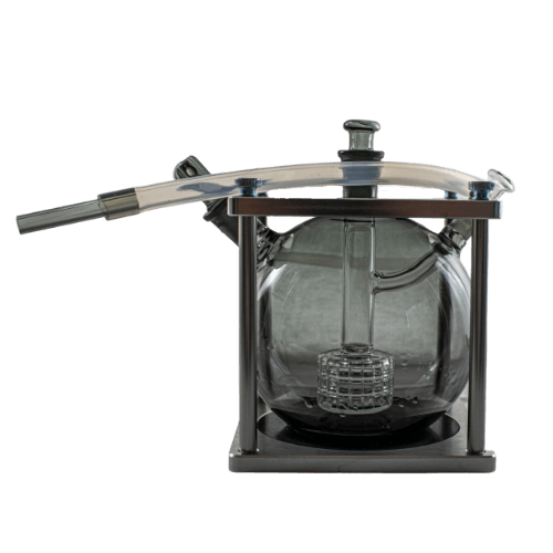 This is the Elephant Cage from Ritual Glass available at Ritual Colorado. Featuring a massive globe body this impressive water piece provides maximum vapor cooling for the perfect hit every time. Includes an aluminum cage, three connections, a trumpet mouthpiece, and whip this is a great daily driver glass piece!