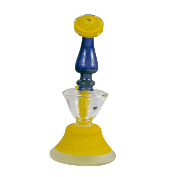 This is the Goldmember and Cobalt Alien Skin Butter Water Filter (#746) from Elev8 available at Ritual Colorado. This heady rig features a 14mm female connection and stunning blue and yellow colors. This handmade American glass is a great addition to any collection.