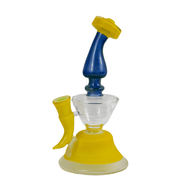This is the Goldmember and Cobalt Alien Skin Butter Water Filter (#746) from Elev8 available at Ritual Colorado. This heady rig features a 14mm female connection and stunning blue and yellow colors. This handmade American glass is a great addition to any collection.