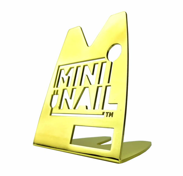 This is the MiniNail Heater Coil Stand in gold available at Ritual.