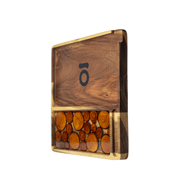 This is the Acacia Wood Tray from Ongrok available at Ritual. Each rolling tray is unique and features handmade details and a foodsafe finish.