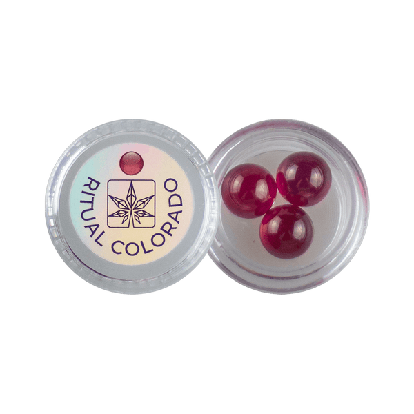 These are 10mm Ruby Terp Pearls available at Ritual Colorado. Offering additional surface area inside your banger or eRig rubies are a great way to upgrade your dab session.