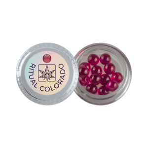 These are 6mm Ruby Terp Pearls available at Ritual Colorado. Offering additional surface area inside your banger or eRig rubies are a great way to upgrade your dab session.