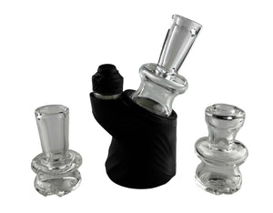 These are Clear Puffco Peak Glass Dry Tops by Technicolor Tony available at Ritual Colorado. Featuring sleek shapes in crisp clear glass these are a stylish glass upgrade for your erig.