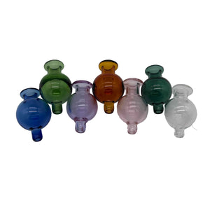 These are Classic Bubble Caps - Large (26mm) by Ritual Essentials available at Ritual Colorado. Handmade in Denver, Colorado, these sleek carb caps offer directional airflow and a clean seal on bangers up to 30mm in diameter.