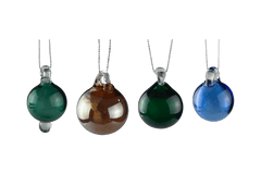 These are Holiday Globe Ornaments by Biting Glass available at Ritual Colorado. Classic sphere ornaments in vibrant colors and featuring a built-in glass bail for longevity.