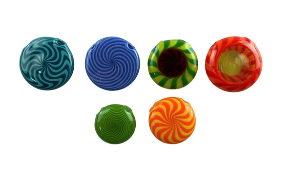 These are vibrant Glass Spiral Disc Pendants by Technicolor Tony available at Ritual Colorado. Colorful glass jewelry piece featuring intricate patterns and vibrant glass colors.