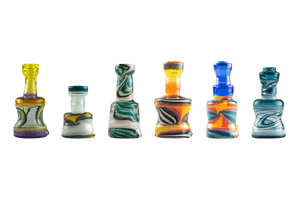 This is the Wig Wag Puffco Peak Dry Top from Technicolor Tonys available at Ritual Colorado. Featuring a multi-color swirling base accented by a bright colored mouthpiece these are a great locally made upgrade to your eRig.