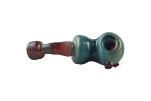 This is the amber purple ladle pipe by Technicolor Tonys available at Ritual Colorado. The beautiful hand pipe features swirling amber purple glass and a carb on the left side of the bowl. 