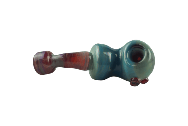 This is the amber purple ladle pipe by Technicolor Tonys available at Ritual Colorado. The beautiful hand pipe features swirling amber purple glass and a carb on the left side of the bowl. 