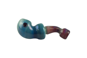 This is the amber purple ladle pipe by Technicolor Tonys available at Ritual Colorado. The beautiful hand pipe features swirling amber purple glass and a carb on the left side of the bowl. 