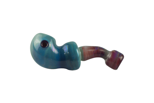 This is the amber purple ladle pipe by Technicolor Tonys available at Ritual Colorado. The beautiful hand pipe features swirling amber purple glass and a carb on the left side of the bowl. 