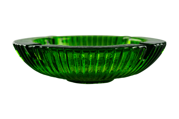 This is an Avocado Anchor Hocking Soreno Glass Ashtray from Heady Vintage available at Ritual Colorado. The beautiful green color is accented by a deep center well and four indents around the outside for easy storage of you joint, blunt, vape or dab gear.