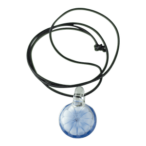 This is the Azure Burst Dot Stack Pendant from Faltermeier Glass available at Ritual Colorado. Exploding with tons of shades of blue and featuring an included leather cord this is an impressive piece of handmade glass art at a great price. 