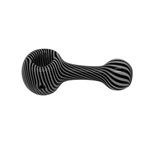 These are Black & White Swirl Spoon Pipes by Technicolor Tony available at Ritual Colorado. These handmade glass hand pipes feature intricate swirling black & white patterns for a stylish everyday option.