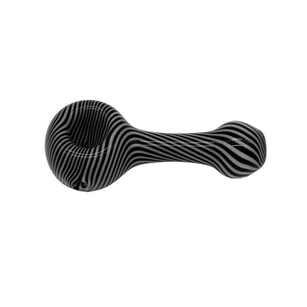 These are Black & White Swirl Spoon Pipes by Technicolor Tony available at Ritual Colorado. These handmade glass hand pipes feature intricate swirling black & white patterns for a stylish everyday option.
