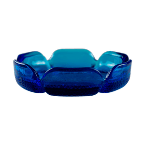 This is the Blenko Blue Lotus Glass Ashtray from Heady Vintage available at Ritual Colorado. The beautiful vintage ashtray features slits around the "petals" for convenient storage of your smoking and vaporizing tools. 