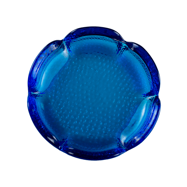 This is the Blenko Blue Lotus Glass Ashtray from Heady Vintage available at Ritual Colorado. The beautiful vintage ashtray features slits around the "petals" for convenient storage of your smoking and vaporizing tools. 