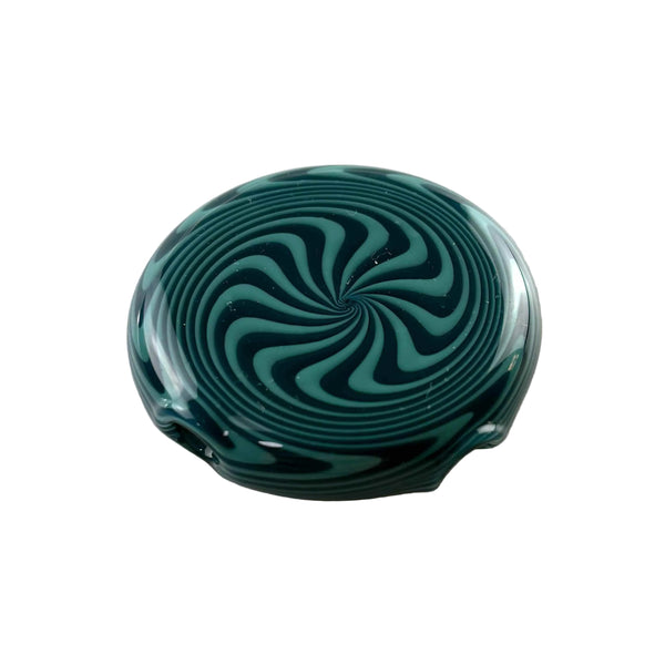 This is the Blue Spiral Disc Pendant by Technicolor Tony available at Ritual Colorado. A vibrant glass jewelry piece featuring intricate patterns and vibrant glass colors.